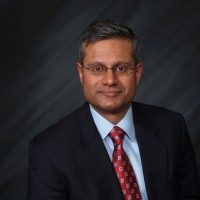 Dr. Sandeep Jejurikar in Suit